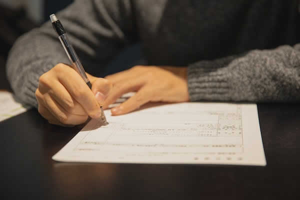 person filling out a form